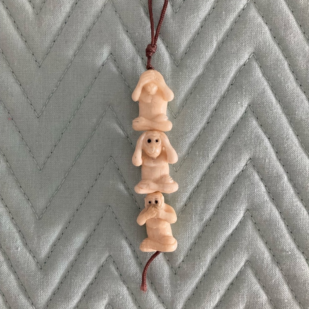 Scrimshaw monkey charm